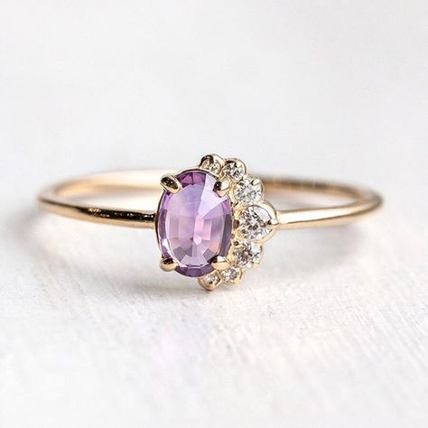 It's back! The Purple Sapphire Astra Ring features a lovely oval purple sapphire with a sweeping galaxy of sparkling white diamonds on one side all set in 14k gold. Available only at melaniecasey.com. Melanie Casey, Gold And Purple, Purple Rings, Purple Sapphire, The Purple, White Diamonds, Cute Jewelry, Diamond White, Sapphire Ring