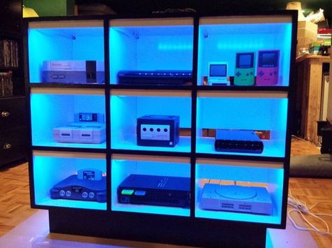 LED lit up console gaming shelves via mikeyfids on Instructables. Organized game systems in colorful light displays.: Video Game Console Shelf, Game Console Shelf, Gaming Shelf, Video Game Organization, Gaming Stand, Display Collections, Video Game Storage, Console Display, Austin Apartment