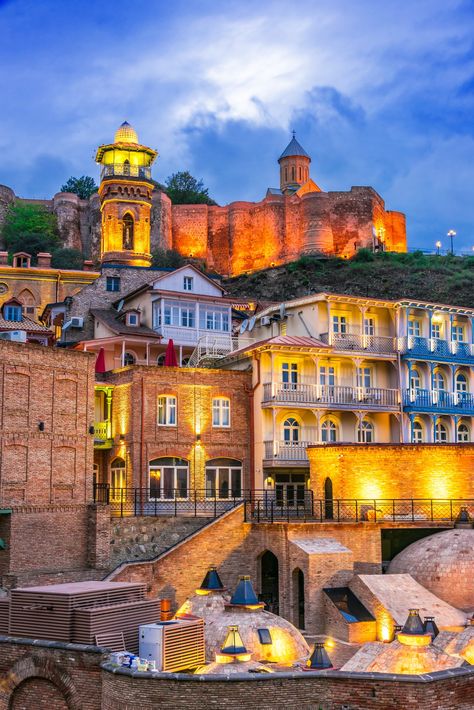 Immerse yourself in the magic of #Tbilisi, Georgia. Wander through the charming old town, relax in the age-old sulfur baths, and savor the taste of traditional Khachapuri. A blend of Eurasian cultures at the crossroads of continents. 🇬🇪🍷 #Travel #GeorgianGems #TbilisiTales Narikala Fortress, Georgia Aesthetic, Car Trip, European Cuisine, Georgia Travel, Tbilisi Georgia, The Crossroads, Night View, Cable Car