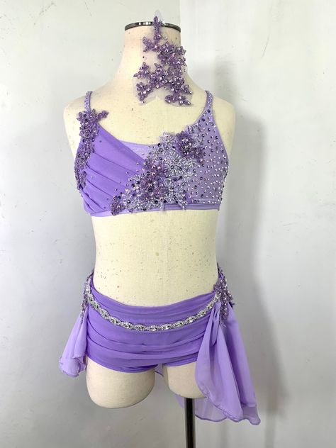 "Lyrical Dance Costume, lavender dance costume, lace dance costume, lyrical dance leotard, custom dance costume, team dance costume Lyrical Dance Costume . Light Lavender 2 pc dance costume with lace detailing and lots of beaded Appliques with Swarovski rhinestones appliqués. Crystal AB rhinestones and crystal ab Swarovski rhinestoned straps. Lavender glisinette side skirt attached to brief This ONE OF A KIND costume is Available to ship in size LC in lavender TO place a CUSTOM COSTUME ORDER ple Lavender Dance Costume, 2 Piece Lyrical Dance Costumes, Rapunzel Dance Costume, Purple Dance Costumes Lyrical, Custom Lyrical Costume, Purple Dance Costumes, Lyrical Dance Costumes Solo, Lace Dance Costumes, Dance Costume Lyrical