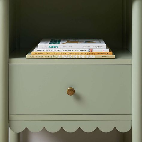 Introduce a touch of charm and practicality to your bedroom with the Maisie Scalloped Bedside Table. Featuring a spacious drawer and open shelf, this sage green table is accentuated with scallop detailing and sturdy wood legs. Its subtle colour and bronze finish handle make it a versatile choice for both neutral and vibrant decorating schemes. Ideal for adding stylish storage to any sleeping space.Stylish StorageEasily stow away your nighttime essentials in the sizeable drawer, while the lower s Sage Green Table, Nightstand Aesthetic, Childrens Bedroom Decor, Mo Willems, Green Table, Night Table, Children's Bedroom, Painting Vintage, Open Shelf