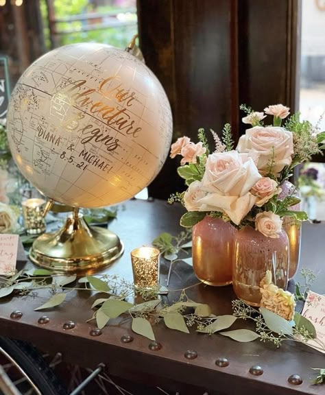 Wedding Globe Decor, Globe Guest Book Wedding, Suitcase Centerpieces Travel Themes, Modern Wedding Shower Ideas, Travel Themed Centerpieces, Travel Theme Centerpiece Ideas, Travel Theme Bridal Shower Ideas, Travel Theme Wedding Centerpieces, Travel Wedding Theme Decoration