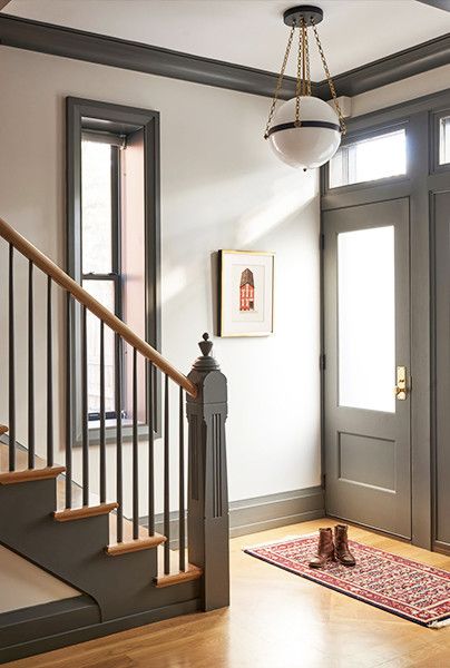 Painted Trim Ideas {That Aren't White} - The Honeycomb Home Charcoal Trim White Walls, Dark Color Trim Interior, Entryway Paint Ideas Foyers Wall Colors, Charcoal Trim Interior, Dark Trim Interior, Darker Trim Lighter Walls, Dark Trim Light Walls, Light Walls Darker Trim, Townhouse Interior Design