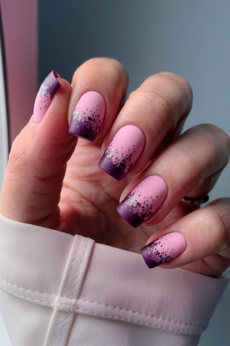 Step up your fall fashion game with this stunning nail design! Featuring a pink base blended into a deep purple ombre, this look is topped off with glitter accents, making it the perfect trendy choice for fall. If you're looking for fall nail ideas that combine elegance and a bit of sparkle, this design is sure to turn heads. Fall Nails Pink, Nails Pink Purple, Fall Nail Design, Fall Nail Ideas, Vibrant Nails, Purple Ombre, Fall Nail, Trendy Fall, Fall Nail Designs