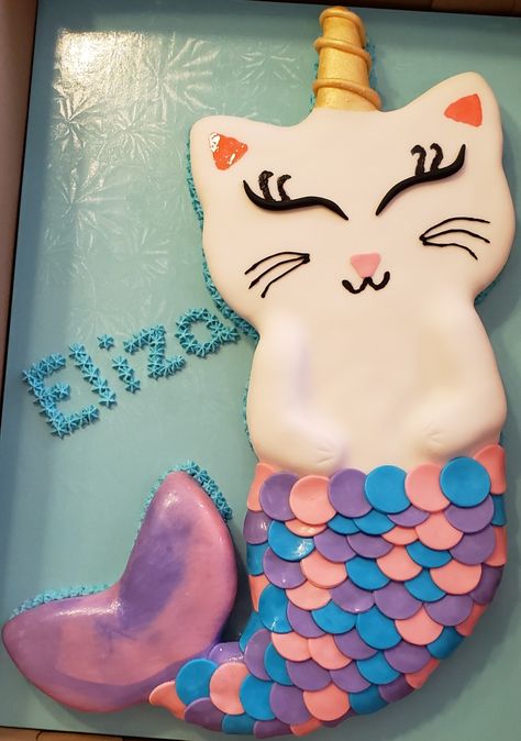 I blew up a picture from the internet and used it to cut out cake from a 1/2 sheet cake. Covered in fondant.  Cut out fondant circles for tail.  Piped on face. Kitty Mermaid Cake, Cat Mermaid Birthday, Purrmaid Cake, Mercat Birthday Cake, Mermaid Cat Birthday Party, Mermaid Cat Cake, Purrmaid Party, Mercat Birthday Party, Mercat Cake