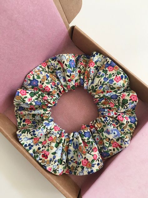 ♡ Lovely floral scrunchies.  ♡ Made with beautiful Oeko-Tex certified 100% cotton poplin by Rose and Hubble. ♡ Suitable gifts for families, friends, and yourself. ♡ Handmade with love and care. ♡ It wraps around your hair 2 - 3 times depending on thickness of your hair. ♡ The diameter of the product is about 10cm. ♡ Scrunchies come in a box. ♡ Washing care  We recommend hand washing with cool temperature. ♡ We have more than 60 patterns in our shop. Please visit :) Gifts For Families, Floral Scrunchie, Scrunchie Hair, For Her Gifts, Scrunchie Hairstyles, Cotton Poplin, Hand Washing, Hair Ties, Scrunchies