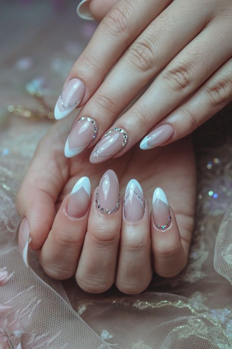 Step up your nail game with these stunning almond nails adorned with delicate rhinestones. Perfect for any season, this elegant style combines chic designs with a touch of sparkle, making them ideal for both casual outings and classy events. Whether you're inspired by summer vibes or winter glam, these pretty and trendy nails will surely turn heads. Elevate your look and enjoy the fun of flaunting these gorgeous almond nails! #AlmondNails #NailArt #Rhinestones #NailInspo #TrendyNails Almond Nails With Rhinestones, Elegant Almond Nails, Vibrant Nail Designs, Nails With Rhinestones, Winter Glam, Summer Nail Ideas, Bright Summer Nails, Vibrant Nails, Bright Nails