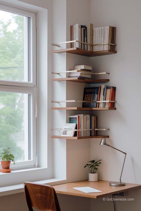 Up next is a minimalist corner, optimized with floating bookshelves. The gold accents on the shelves add a touch of elegance and sophistication to the space. Floating Book Shelves, Minimalist Bookshelves, Bookshelf Ideas, Bookshelves In Bedroom, Floating Bookshelves, Unique Shelves, Corner Bookshelves, Desks For Small Spaces, Small Home Offices