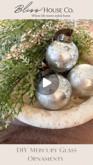 Amanda Muster |Virtual & Local Interior Design| NY on Instagram: "DIY Mercury glass ornaments!! I absolutely LOVE mercury glass and these were so easy and a fraction of the price to buy! 

💕Comment “DIY” for the materials to be sent to your DMSs

#vintagestyle #vintagedesign #modernvintagehome #fallhome #transitionalstyle #oldhomerenovations #homedecoration #hyggehome #nancymyersinteriors #oldhomeinteriordesign #christmasDIY #holidaydecor" Mercury Ornaments Diy, Diy Mercury Glass Ornaments, Mercury Glass Decor, Glass Ornaments Diy, Mercury Glass Diy, Mercury Glass Ornaments, Ornament Display, Gold Spray Paint, Gold Spray