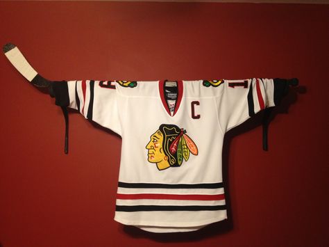 Jersey holder/drape valance/stick display Hockey Jersey Display, Boys Beds, Hockey Crafts, Hockey Bedroom, Hockey Decor, Hockey Room, Jersey Display, Plant Hooks, Blackhawks Hockey