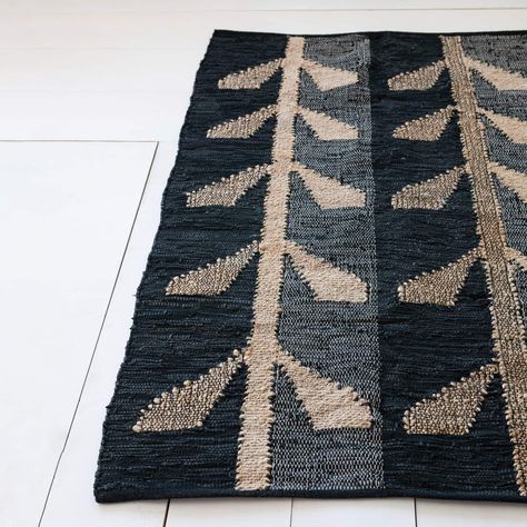 Shop the 4ft. x 6ft. Black & Natural Woven Jute, Leather & Cotton Chindi Rug at Michaels. com. This woven jute, leather, and cotton Chindi rug with a black and natural pattern is a stylish and rustic addition to any space. The fabric is durable and features a geometric pattern in black and natural colors, creating a versatile and elegant look. This woven jute, leather, and cotton Chindi rug with a black and natural pattern is a stylish and rustic addition to any space. The fabric is durable and Mountain House Decor, Cabin Rugs, Nordic Rug, Ranch House Exterior, Hello Honey, Modern Wool Rugs, Modern Textiles, Christmas Rugs, Pretty Decor