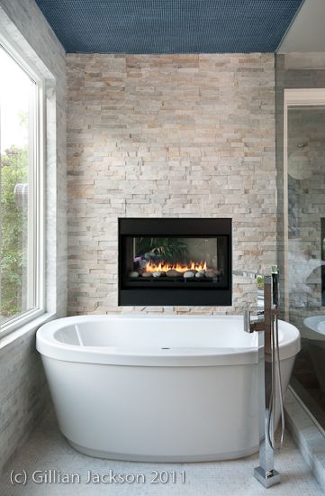 Fireplace feature wall in bathroom  built by www.halldevelopments.com Fireplace In Shower Wall, Electric Fireplace In Master Bath, Fireplace Above Bathtub, Fireplace In Bathroom Wall, Accent Wall Behind Bathtub, Fireplace Bathtub, Bathroom Fireplace Ideas, Feature Wall In Bathroom, Fireplace In Bathroom