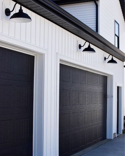 Amanda Stein on Instagram: "When we decided we were going to build a modern farmhouse, these gooseneck lights above our garage doors were a must! I love coming home everyday and seeing them 😍 http://liketk.it/3bc51 #liketkit @liketoknow.it #StayHomeWithLTK #LTKhome #LTKfamily @liketoknow.it.home @liketoknow.it.family Download the LIKEtoKNOW.it shopping app to shop this pic via screenshot . . #farmhouse #modern #modernfarmhouse #modernfarmhouseexterior #exteriordesign #exterior #exteriorsofinsta Lights Above Windows, Black Garage Door, Black Garage, Farmhouse Exterior Design, Garage Door Design, Modern Front Door, Farmhouse Remodel, Casas Coloniales, Modern Farmhouse Exterior