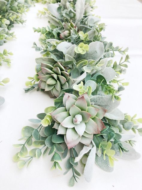 Drape this succulent garland around your wedding welcome sign or use as a table centerpiece. Mantle Greenery, Garland For Mantle, Garland Flower, Garland Decoration, Tafel Decor, Succulent Centerpieces, Eucalyptus Garland, Greenery Garland, Succulent Wedding