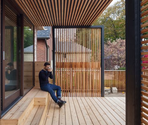 An Outdoor Living Room in Bloor West Village Diy Fences, Easy Weekend Projects, Cedar Deck, Wood Slat Wall, Enclosed Patio, Privacy Walls, Wood Cladding, Cozy Seating, Deck With Pergola