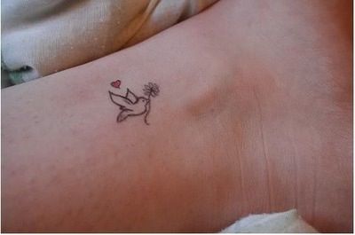 Little bird with flower White Dove Tattoos, Cardinal Tattoo, Vogel Tattoo, Dove Tattoos, Ankle Tattoo Designs, Small Bird Tattoo, Petit Tattoo, Dove Tattoo, Tiny Tattoo