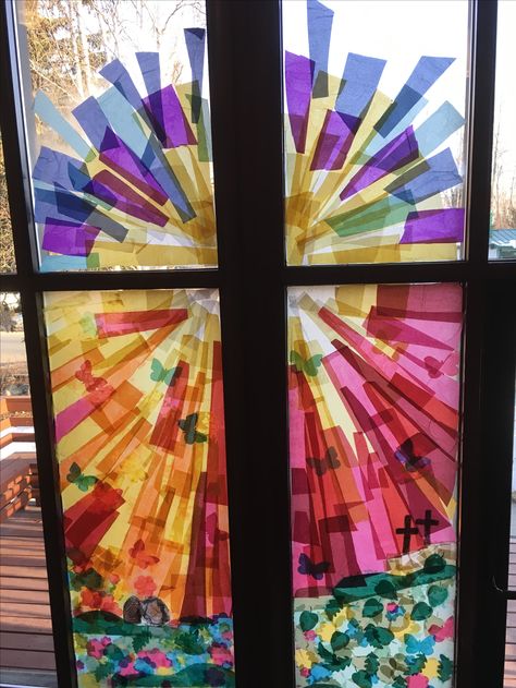 Tissue paper Stainglass on church window for Easter using mod podge and spray bottle Tissue Paper Window Art, Tissue Paper On Windows, Tissue Paper Mosaic, Diy Paper Stained Glass Windows, Tissue Paper Window, Construction Paper Stained Glass Window, Tissue Paper Stained Glass Craft, Tissue Paper Stained Glass Window, Diy Stained Glass Window Tissue Paper