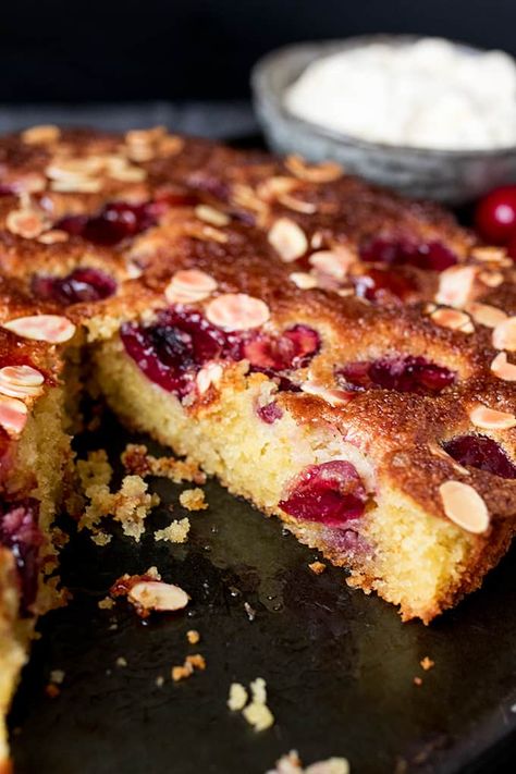 A fluffy Cherry and Almond Cake with fresh cherries and dollops of jam. So tasty and gluten free too! Christmas Cake Ideas, Cherry And Almond Cake, Almond Flour Cakes, Almond Cake Recipe, Flourless Cake, Cherry Desserts, Gluten Free Bakery, Cherry Cake, Cherry Recipes