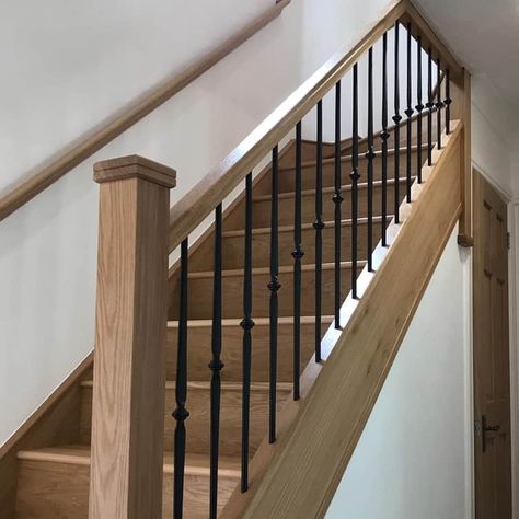 Wood Stairs Metal Railing, Metal Spindals For Staircase, Staircase Spindle Ideas Wood, Modern Spindles, Open Sided Staircase, Diminishing Staircase, Banisters And Railings Makeover Metal, Oak Staircase With Metal Spindles, Oak Stairs Black Spindles