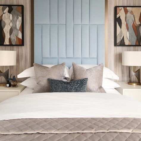 An abstract artwork piece harmonises the colour palette in this design. An upholstered headboard, extended to the ceiling, introduces a striking sense of scale.  Tip: Consider scaling up the room’s main feature to make a bold statement. Photographer credit: @tomstaubynphotography #dapaatelier #interiordesign #bedroomdesign Wall Fabric Headboard, Hanging Fabric Headboard, Upulstored Headboard, Hanging Upholstered Headboard, Wall Between Windows, Abstract Headboard, Headboard Wall, The Ceiling, Upholstered Headboard