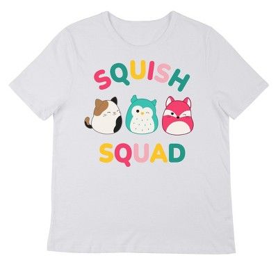 Join the Squish Squad with this Squishmallows tee. The shirt features an image of Cam the Cat, Winston the Owl, and Fifi the Fox while rainbow letters spell out, “Squish Squad.” The tee comes in a white short sleeve crew neck. Fans of the Squishmalllows will love this comfy cotton t-shirt. Squish Squad, Squishmallow Party, Rainbow Letters, Sleeve Packaging, Pad Design, Sleeves (women), White Short, The Fox, White T