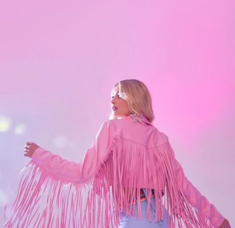 Fringe Outfit Party, Taylor Swift Fringe Jacket, Taylor Swift Rainbow Outfit, Sparkly Pink Fringe Skirt, Pink Disco Cowgirl Aesthetic, Pink Fringe Jacket Outfit, Taylor Swift Fringe Outfit, Neon Cowgirl Aesthetic, Eras Concert Outfit