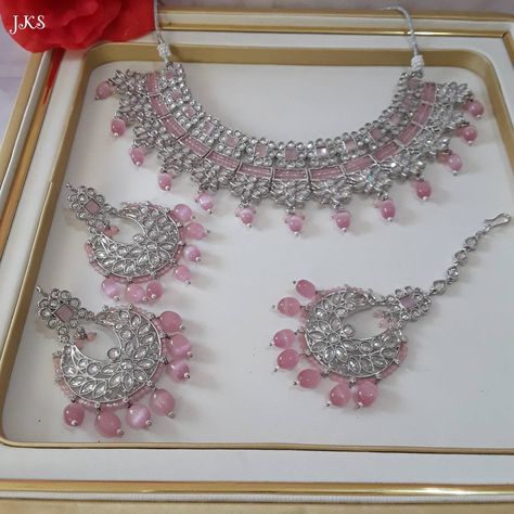 Gorgeous Indian silver plated statement necklace set with matching earrings & maang tikka  The picture shown is of the real product and you will receive exactly what is shown in the picture  Main Colour: Silver  Stone Colour: Clear Pearl Colour: Baby Pink  Necklace Closer: Adjustable necklace cord to fit according to your neck size. Earrings Size : L x 8 cm / W x 5.7 cm Maang Tikka Size: Medium  The item is described to the best of our ability. Please contact us if you have any question related to this product a we will be happy to assist you with.  Note: There may be a slight difference due to photographic lighting sources or your monitor settings. If you want to upgrade your delivery, please add the item in the basket to pay for expedited delivery during checkout, if need any help, conta Pink Necklace Jewelry Indian, Jewellery Set Silver, Desi Things, Kundan Jhumka, Maang Tikka Set, Silver Bridal Jewellery, Bridal Jewellery Set, Pink Jewelry Set, Bridal Jewelry Sets Brides