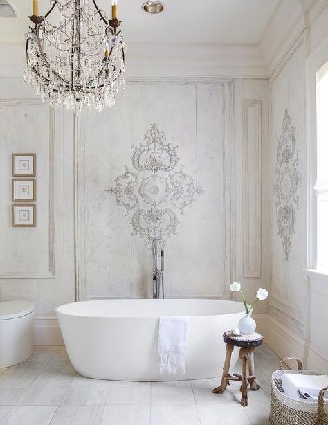 With a backdrop of light gray paneled walls, a gorgeous damask design creates a dramatic focal point around wall trimming and a light distressed finish. Tara Shaw, Neoclassical Design, New Orleans Homes, Cottage Kitchens, Bath Tub, Free Standing Tub, Cozy Cottage, Beautiful Bathrooms, White Bathroom