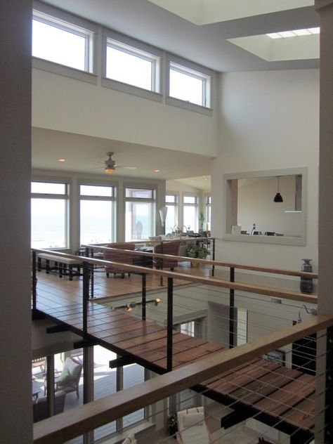 Beach house atrium w/ wood  steel bridge House Atrium, School Stairs, Alternative Living, Steel Bridge, Inside A House, Sky Bridge, Renovation Architecture, Bungalow Renovation, House Extension Design