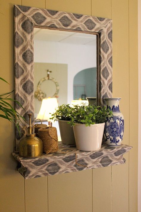 Frame a plain Jane mirror using fabric & Mod Podge. Diy Mirror Frame Ideas, Mirror Makeover Diy, Mirror Frame Ideas, Diy Mirror Frame, White Mirror Frame, Bathroom Mirrors Diy, Diy Storage Rack, Mirror Frame Diy, Bathroom Mirror Frame