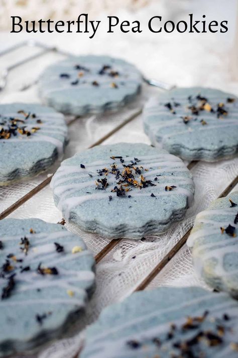 These butterfly pea cookies are rich and buttery with a lovely crumbly texture. They are naturally colored, very elegant and simply delicious! #butterflypeacookies #butterflypeacookie #butterflypeaflowercookies #butterflypeacookierecipe #bluecookies #bluematchacookies #decoratedtreats Butterfly Pea Cookies, Butterfly Pea Flower Dessert, Butterfly Pea Dessert, Butterfly Pea Flower Cookies, Butterfly Pea Flower Recipe, Butterfly Pea Recipe, Spring Cookies Recipes, March Cookies, Pea Cookies