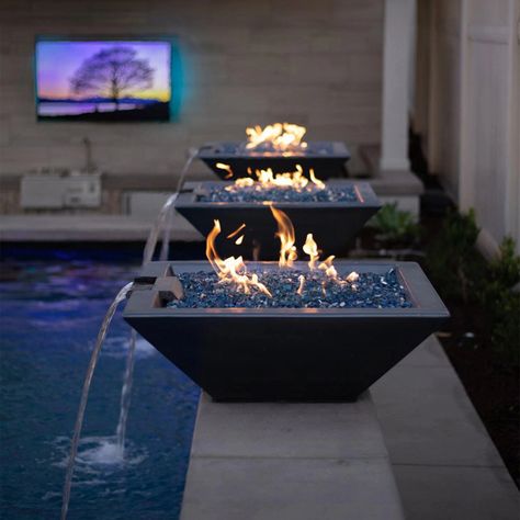 Who says fire and water don't mix? Unite the elements with the 30" Square Concrete Fire and Water Bowl  and bask your senses in the therapeutic sounds of flowing water and the graceful movement of a flickering flame. In the center, this handmade bowl features a mesmerizing flame rising from a bed of lava rock and along the rim water flows outward from the copper scupper.  You can customize your fire and water bowl by choosing from a variety of colors which include black, ash, gray, limestone, ch Gfrc Concrete, Geode Decor, Florida Pool, Fire And Water, Fire Water, Black Ash, Backyard Pool Designs, Backyard Retreat, Home Landscaping