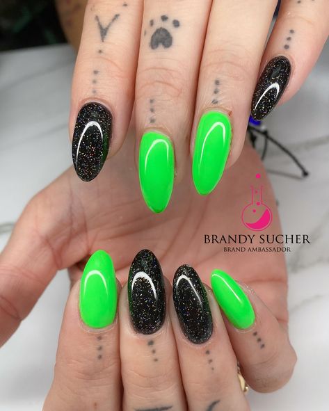 Green with envy over these bright nails and black glitter accents! 💚🖤✨ @lightelegancehq products -Smokin’ Hot Pepper glitter gel -Black Tie #summernails #glitternails #brightnails #lebrandambassador #getklawed #480nails #602nails #aznails #nailsmagazine #tempe #nails #nailsofinstagram #nailinspo #independentnailtech #gelx #acrylicnails #gelnails #hardgelnails #hardgel #biabnails ✨Use my code “BRANDY15” to get 15% off your first order✨ Black Lime Green Nails, Black And Lime Green Nails, Lime Green And Black Nails, Bright Green And Black Nails, Neon Green Sparkle Nails, Lime Glitter Nails, Bright Green Glitter Nails, Lime Green Ombre Nails Neon Yellow, Lime Green Nails