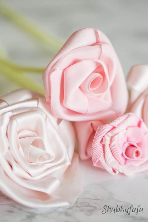 Did you ever want to learn how to make ribbon roses? This easy 10 minute no sew easy diy ribbon roses tutorial will show you how and this is a beginner level project! #ribbonrose #ribbon #weddingcrown #fakeflowers #budgetflowers #weddingdiy #silkflowers #ribbonproject #shabbyfufu Diy Ribbon Roses, Fake Roses, Ribbon Flowers Diy, Ribbon Projects, Satin Ribbon Roses, Flowers Ribbon, Ribbon Flower Tutorial, Bow Ideas, Ribbon Rosettes