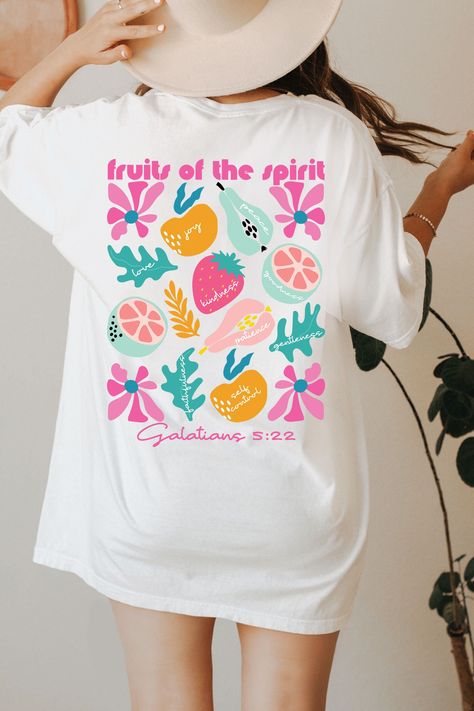 Spread a Message of Faith and Joy with this cute and unique Fruits of the Spirit Shirt! This Christian Comfort Colors® Tshirt is super comfy! Size up for a Trendy Oversized Look! ♥ Hello and Welcome to Meaningful Tees Shop! ♥ Models are wearing White, Ivory and Blossom ♥ All of our items are made one at a time with care for each customer : ) ♥ Please allow 3-7 BUSINESS days (usually 3-5) for your item to be created PLUS shipping time via USPS ♥ UNISEX TEES fit like a Mens Shirt on Women, but are Cute White T-shirt With Fruit Print, Cute White T-shirt With Plant Print, Pink T-shirt With Plant Print, Short Sleeve, White Crew Neck Shirt With Fruit Print, Fun White T-shirt With Fruit Print, Cute Short Sleeve T-shirt With Plant Print, White Tops With Fruit Print And Short Sleeves, Pink Fruit Print Graphic Tee, Cute Floral Graphic Print Tops