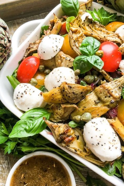 An Italian classic, enjoy our Roasted Artichoke and Mozzarella Salad. A twist on an antipasto salad, it's a delicious way to enjoy fresh artichokes. #antipasto #salad #roastedartichokes #artichokes #mozzarella #freshmozzarella #italiansalad Antipasto Salad Recipe, Italian Antipasto, Artichoke Salad, Roasted Artichoke, Antipasto Salad, Mozzarella Salad, Bacon On The Grill, Trip To Italy, Italian Salad