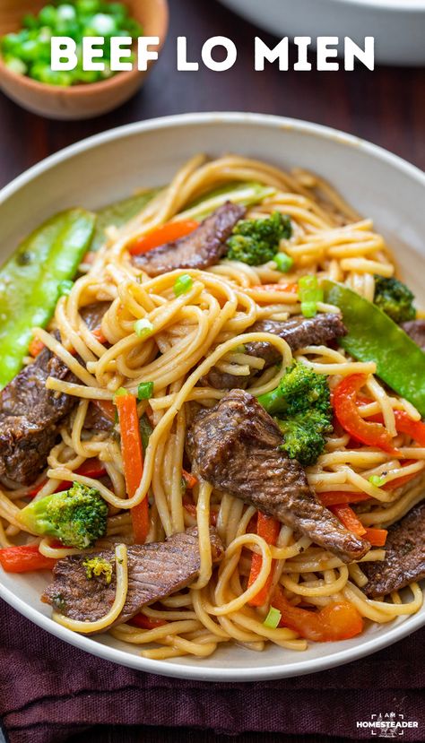 Beef Lo Mein is marinated tender strips of steak mixed with fresh vegetables, lo mein noodles, and an easy-to-make sweet and savory sauce. Lo Mien, Beef Lo Mein Recipe, Beef Lo Mein, Steak Strips, Lo Mein Noodles, Lo Mein Recipes, Asian Beef, Beef Strips, Lo Mein