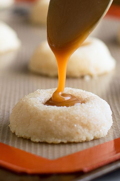 Classic shortbread thumbprint cookies with delicious homemade butterscotch filling. Thumbprint Cookie Recipes, Butterscotch Filling, Butterscotch Shortbread, Shortbread Thumbprint Cookies, Best Thumbprint Cookies, Cookie Assortment, Homemade Butterscotch, Thumbprint Cookie, Homemade Shortbread