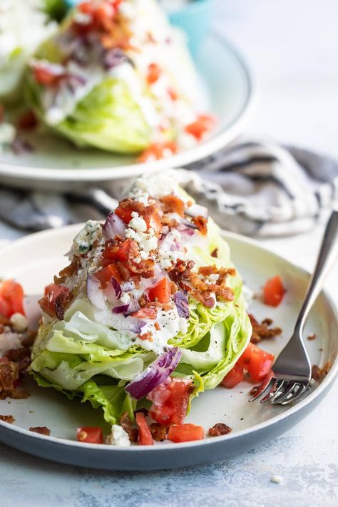 Inspired by the classic steakhouses, this Iceberg Wedge Salad is smothered in creamy blue cheese dressing and topped with bacon, tomatoes, and more blue cheese crumbles. Iceberg Wedge Salad, Iceberg Salad, Wedge Salad Recipes, Lettuce Wedge, Blue Cheese Dressing Recipe, Cabin Food, Wedge Salad, Cheese Wedge, Red Onion Salad