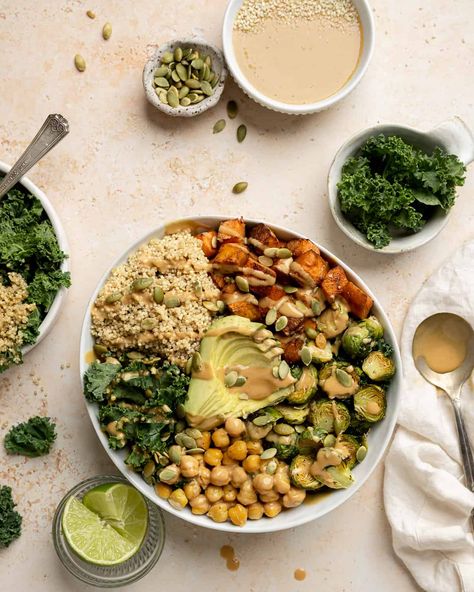 Loaded with grains, veggies, and plant-based protein, this sweet potato chickpea buddha bowl is an easy, quick, and delicious way to pack a ton of nutrition and flavor into a dish! Topped with a thai peanut sauce, it's the perfect week night meal, is great for meal prep, and can be customized to your preference. Sweet Potato Quinoa Bowl, Quinoa Buddha Bowl, Veg Tray, Chickpea Buddha Bowl, January Meals, Vegan Mushroom Stroganoff, Potato Chickpea, Sweet Potato Quinoa, Thai Peanut Sauce