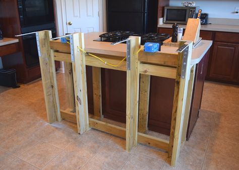 We wanted to add a breakfast bar to the kitchen island and make it bigger. This is the frame and electrical wiring we added to the existing kitchen island. Diy Bar Top, Breakfast Bar Kitchen Island, Kitchen Renovation On A Budget, Build A Bar, Build Kitchen Island, Island Makeover, Kitchen Island Makeover, Island Counter, Diy Kitchen Table