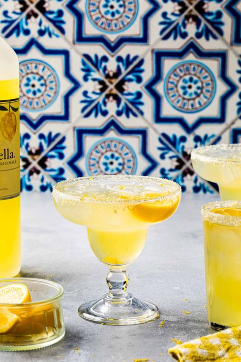 Sweetened with limoncello instead of orange liqueur, Italian margaritas are a unique twist on the traditional tequila cocktail. These limoncello lemon margaritas sure to brighten your summer cocktail repertoire with their beautiful yellow hue. Yellow Margarita, Yellow Cocktails, Tequila And Lemonade, Tequila Based Cocktails, Lemon Margarita, Frozen Watermelon Margarita, Italian Margarita, Blackberry Margarita, Limoncello Cocktails