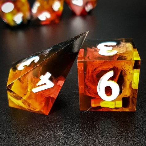 Draugur Dice | Andri🇮🇸 & Gabriella🇭🇺 | Forged in the Flame 🔥 Last set of the "Forged in..." series! Do you have a favorite? 👀 . . . . . #art #dice #ttrpg #dnd #dnd5e… | Instagram Dice Dragon, Dice Goblin, Dungeons And Dragons Art, Dnd Ideas, Dnd Dice, Polyhedral Dice, D&d Dungeons And Dragons, The Flame, Tabletop Rpg