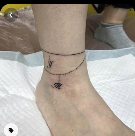 Bracelet Tattoo With Initials, Ankle Bracelet Tattoos For Women, Ankle Bracelets Tattoos For Women, Ankle Bracelet Tattoos, Charm Anklet Tattoo, Tattoo With Initials, Bracelet Tattoo Ideas, Bracelet Tattoos For Women, Anklet Tattoos For Women