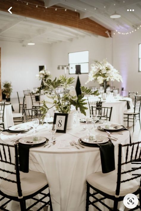 Black And White Wedding With A Pop Of Colour, Cheap Black And White Wedding Decor, Black And White Wedding On A Budget, Black White And Silver Wedding Centerpieces, Spring Wedding Black And White, Black Tablecloth Wedding White Chairs, Black And White Wedding Table Set Up, Black And White Casual Wedding, Classy Black White Wedding