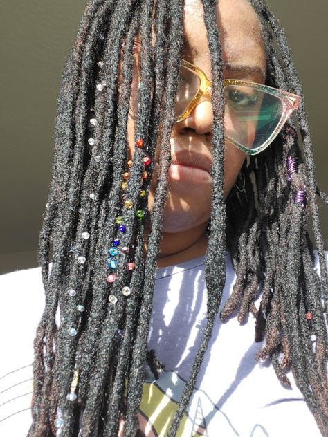 Locs with glass beads in the sun Sprinkle Locs, Loc Sprinkles Locks, Loc Sprinkles, Dreadlocks Jewelry, Prom 2k24, Hair Twists Black, Hair Twists, Loc Inspiration, Loc Hairstyles