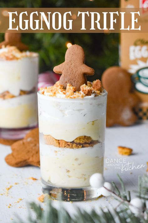 Creamy pudding, gingersnap cookies and fluffy whipped topping make up the layers in this delicious Egg Nog Trifle. It’s the ultimate Christmas dessert! #EggNog #Trifle #NoBake #Dessert #HolidayDessert Gingerbread Eggnog Trifle, Ginger Snap Trifle, Eggnog Trifle Recipe, New Years Trifle, Egg Nog Tiramisu, Eggnog Desserts Christmas, Mini Christmas Trifle, Eggnog Recipes Desserts, Egg Nog Desserts Recipes