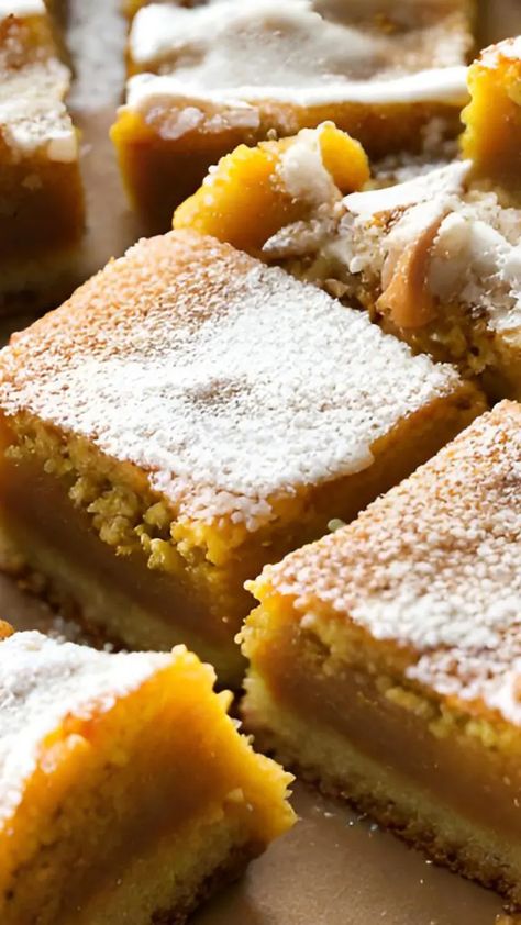 Easy Pumpkin Ooey Gooey Butter Cake Bars | getcakerecipes Paula Deans Pumpkin Gooey Butter Cake, Pumpkin Gooey Bars, Pumpkin Gooey Butter Bars, Ooey Gooey Pumpkin Bars, Gooie Butter Cake Easy, Pumpkin Ooey Gooey Butter Cake, Gooie Butter Cake, Ooey Gooey Pumpkin Cake, Gooey Pumpkin Bars