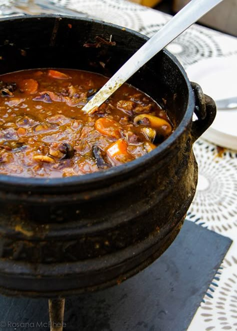 This traditional South African stew of oxtails and red wine is cooked outdoors in a cast-iron pot over coals - perfect campfire food African Stew, South African Dishes, Oxtail Stew, Recipe Crockpot, Oxtail Recipes, Coconut Dessert, Africa Food, African Cooking, Enjoy Your Meal