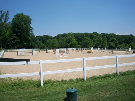 The Outdoor Riding Arena is beside the new Indoor Arena and measures 150' x 250' and features eurofelt footing (100_1428). Riding Arenas Outdoor, Jumping Arena Outdoor, Outdoor Riding Arena Ideas, Horse Riding Arena Outdoor, Outdoor Arena Horses, Outdoor Horse Arena, Outdoor Riding Arena, Arena Footing, Horse Riding Arena